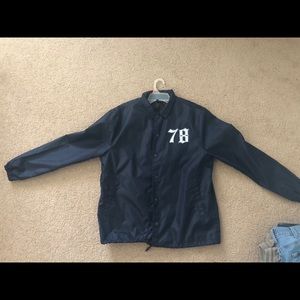 Divided navy windbreaker